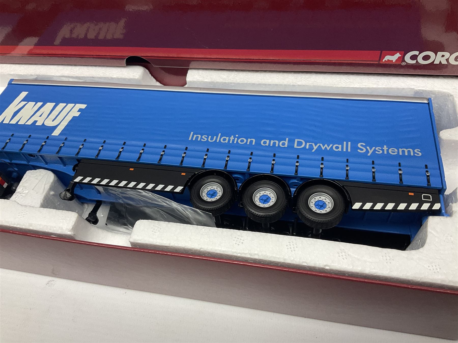 Corgi - three limited edition Hauliers of Renown lorries; CC13715 Scania R Series Topline Houghton Parkhouse 'The Professional' Livestock Transporter Chris Waite Transport; CC13812 Mercedes-Benz Actros Curtainside Eddie Stobart Ltd/Knauf; and CC13911 Foden Alpha Flatbed Trailer & Peat load R.J. & I. Monkhouse Ltd; all boxed with slipcases (3)