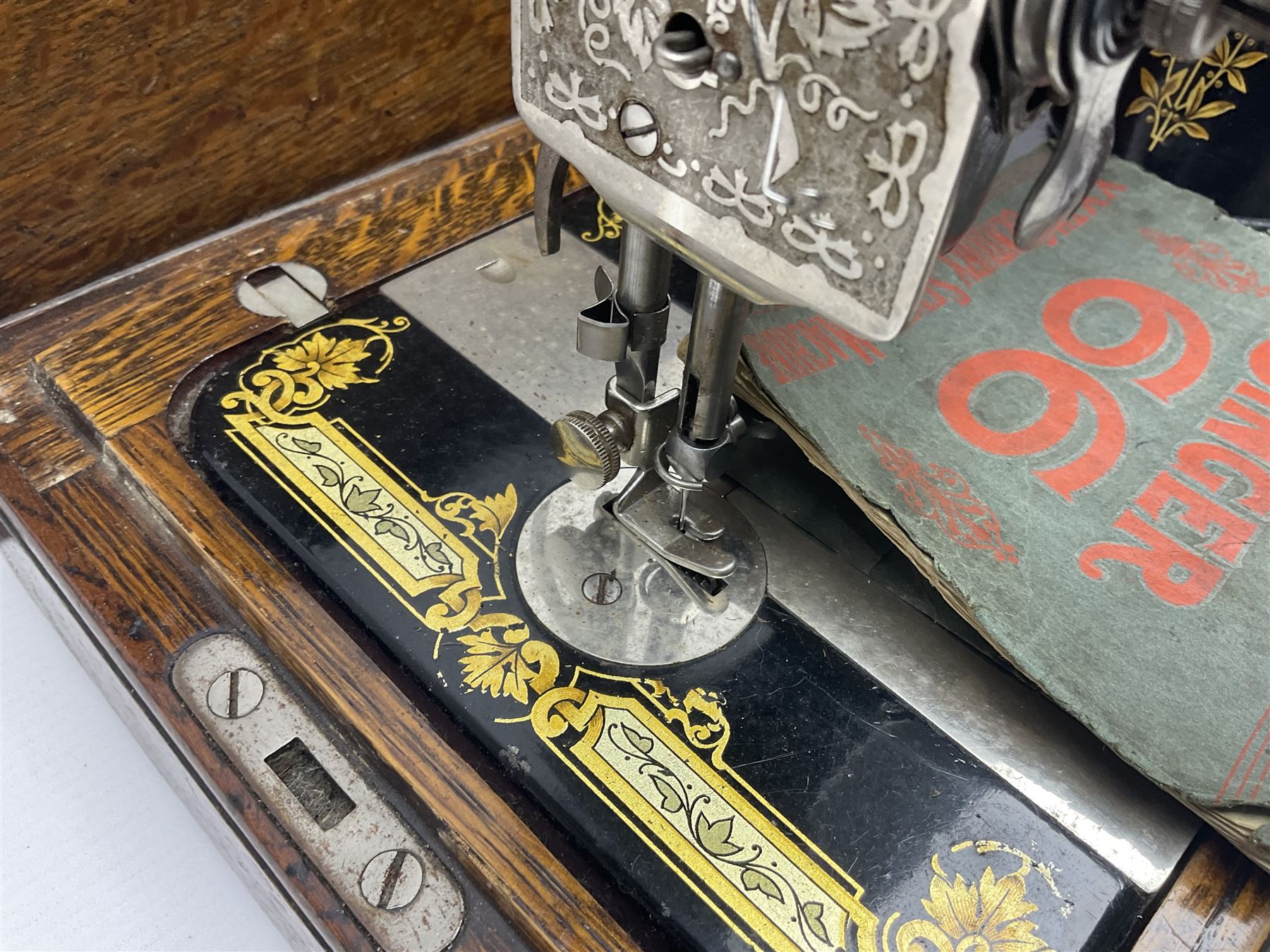 Singer 66 sewing machine in wooden case, together with an LG DVD player with speakers, two portable DVD players, etc 