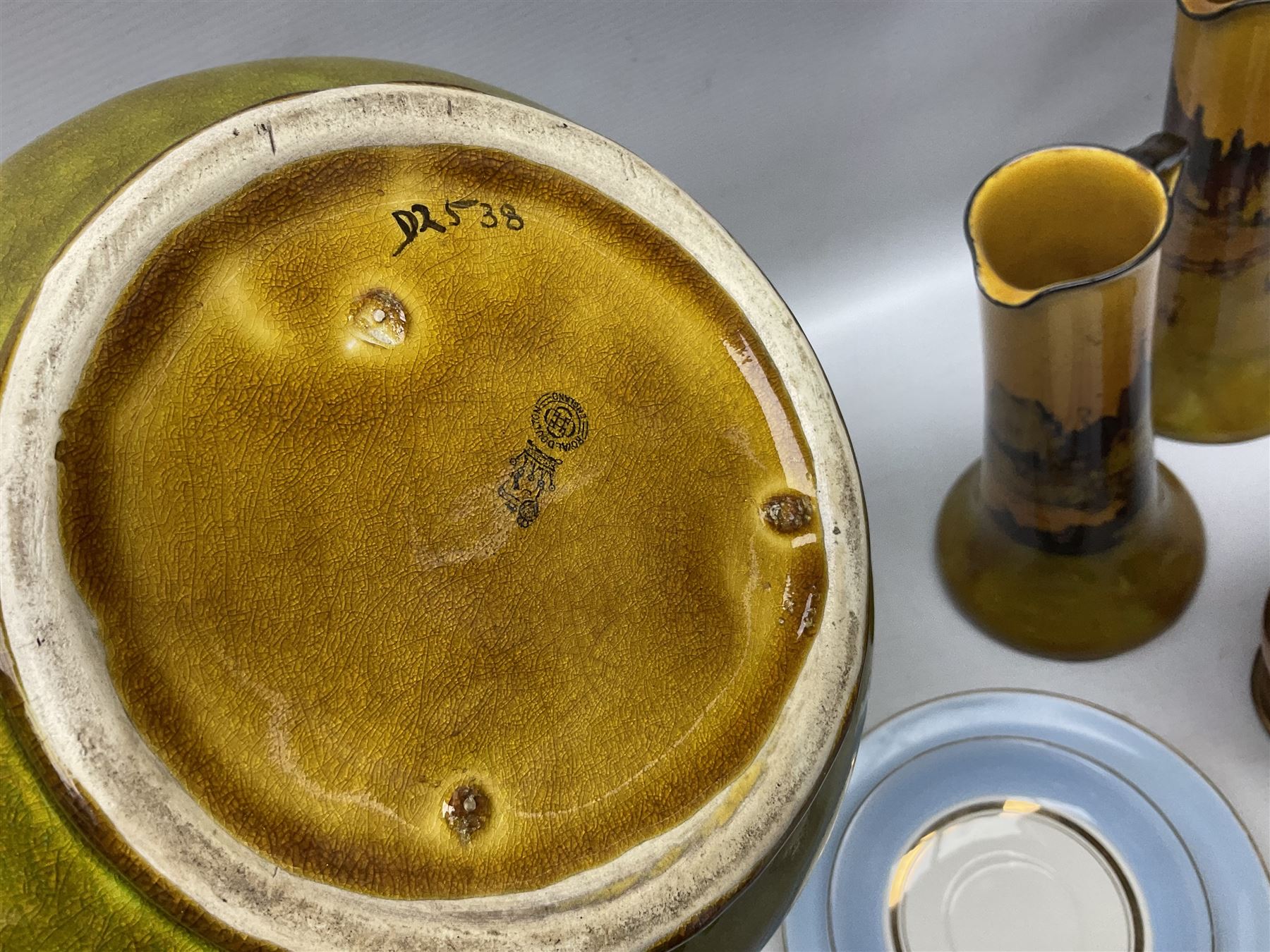 Royal Doulton wide rimmed jardinière, together with two Royal Doulton jugs, Arthur Wood jugs etc