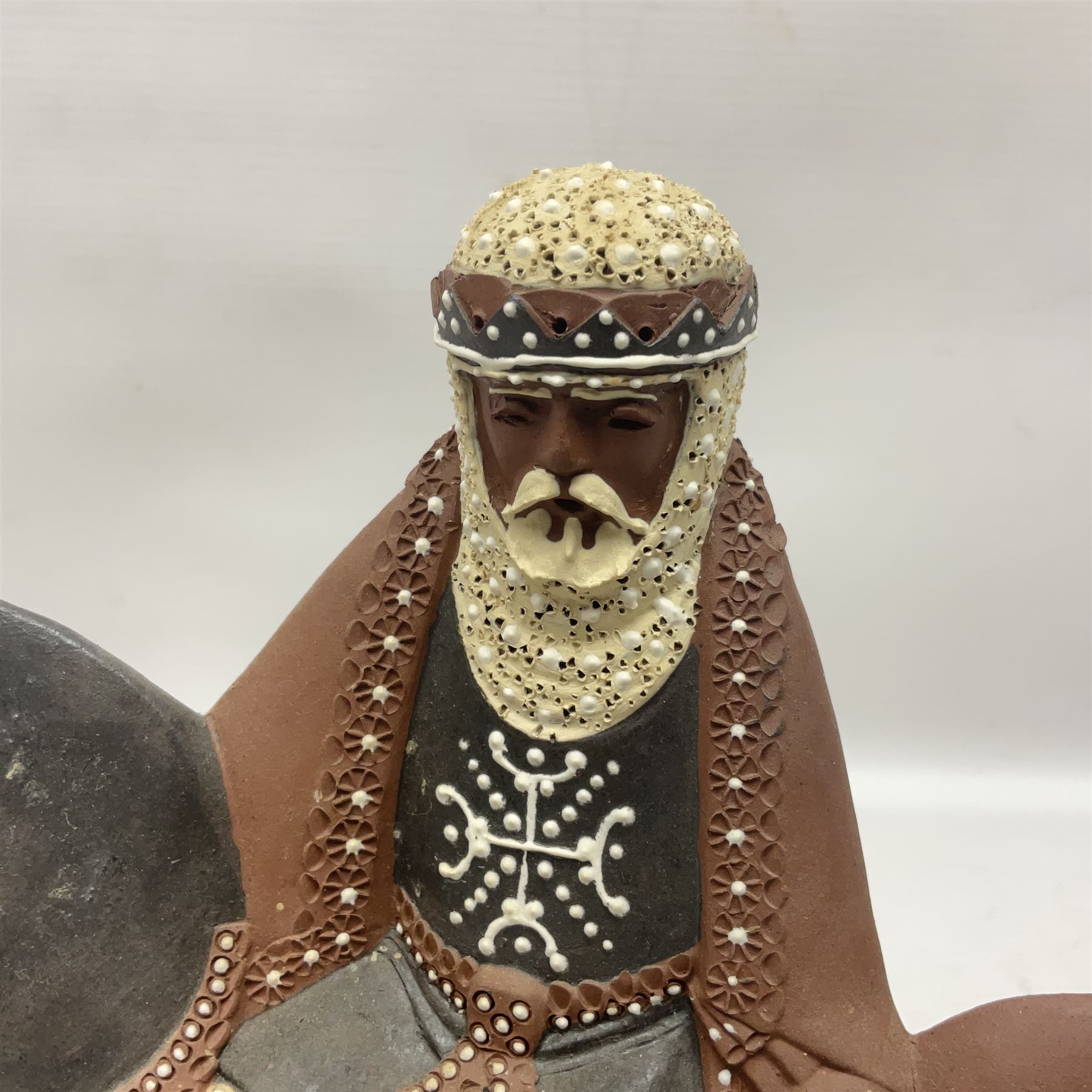 Leonard Stockley; two studio pottery figures modelled as a king and queen upon horses, both signed beneath,  H25cm