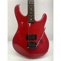 American Peavey Nitro 1 hand-made electric guitar in red with Kahler tremolo, serial no.02786479, L98cm overall; in soft carrying case.
