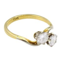 18ct gold two stone round brilliant cut diamond crossover ring, stamped, total diamond weight approx 0.75 carat