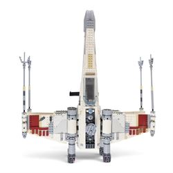 Three Lepin Star Wnrs built models, comprising Red Five X-Wing Starfighter no. 05039, Millennium Falcon no. 05132 and Super Star Destroyer no. 05028