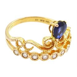 18ct gold pear cut sapphire and nine stone round brilliant cut diamond openwork ring, stamped 750