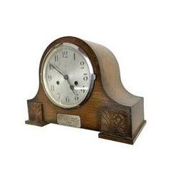 1930s Enfield striking mantle clock in an oak case, with pendulum.