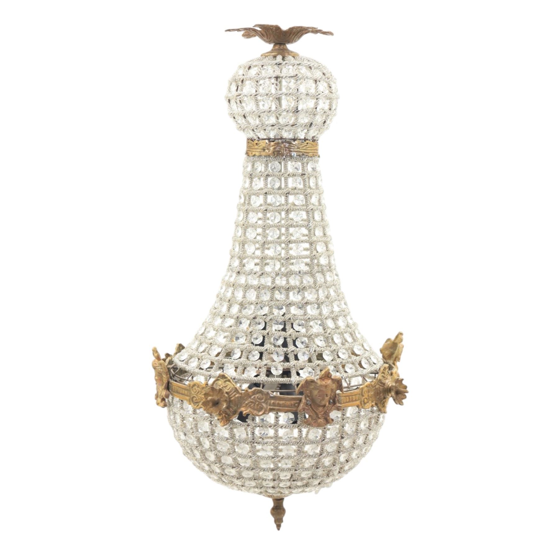 Late 19th century pair of French Empire gilt metal and cut glass bag chandelier, the tapering body formed of faceted glass button drops, with lobed lower bowl, cast foliate and mask mounts, surmounted by a bulbous upper section and terminating with a pendant finial
