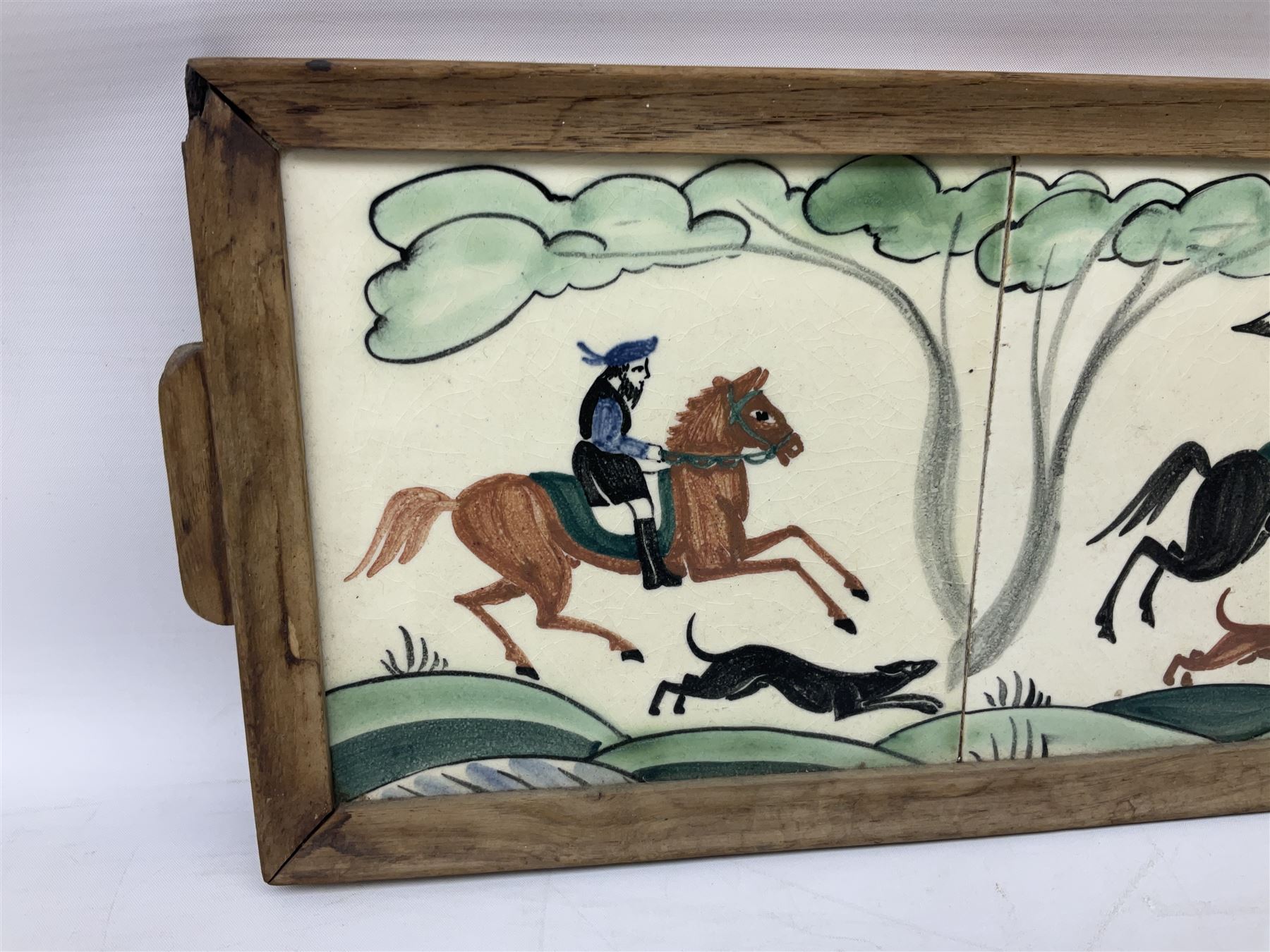 Packard and Ord tile tray hand painted with a hunting scene and a wooden frame, H17cm L48cm