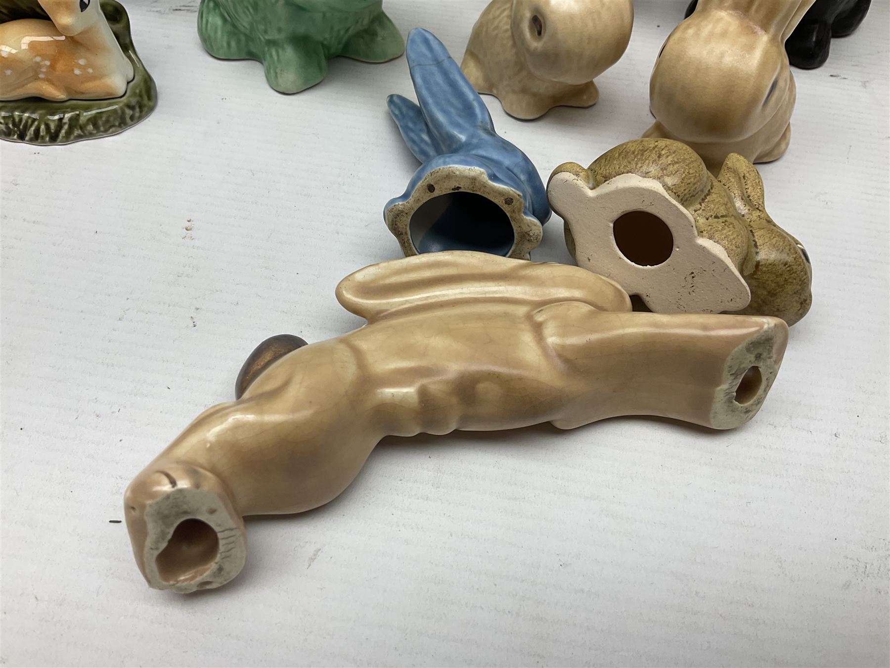 Collection of Sylvac and similar animal figures, including rabbits, hares and dogs, together with Falcon budgie vase, etc 