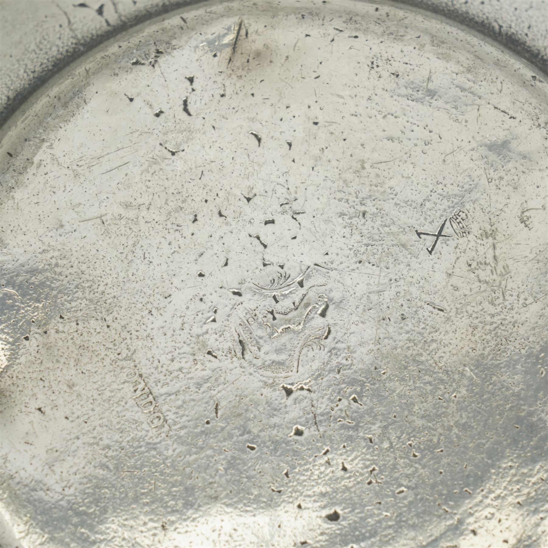 Collection of early 19th century and later British pewter, mostly London label marks, including two large pewter chargers, medicine spoon, flasks, plates and other tableware