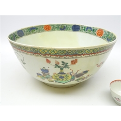  Large 18th century Chinese Export Famille Verte punch bowl, decorated in polychrome enamels with precious objects and flowers, D30cm and 18th century Famille Rose porcelain tea bowl   