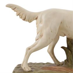 Royal Dux model of a hunting dog, with bird in mouth, upon gilt and green rustic base, marks beneath impressed  1193 and bearing pink applied Royal Dux triangle 
