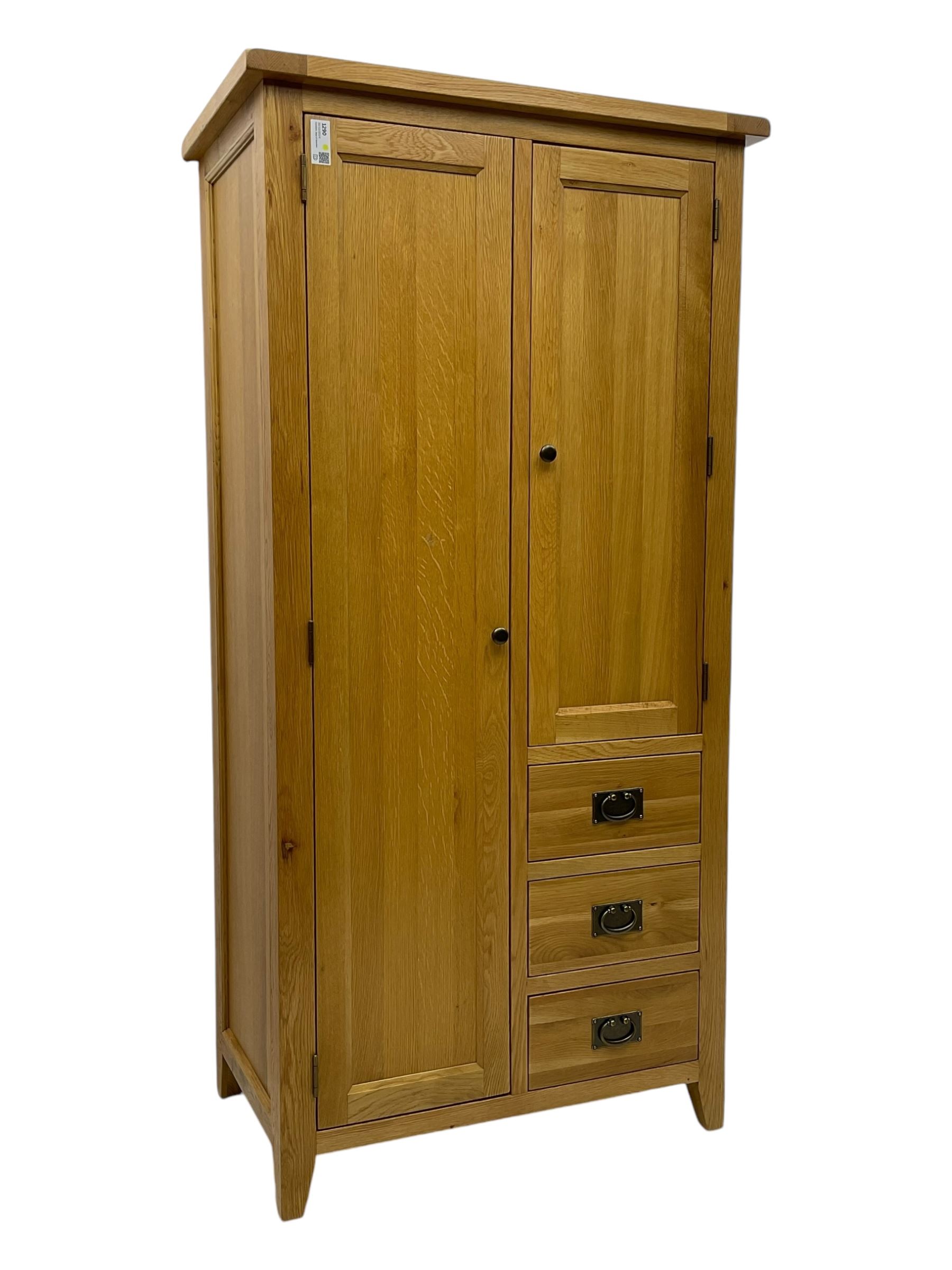 Light oak combination wardrobe, fitted with full-height compartment, single cupboard and three small drawers