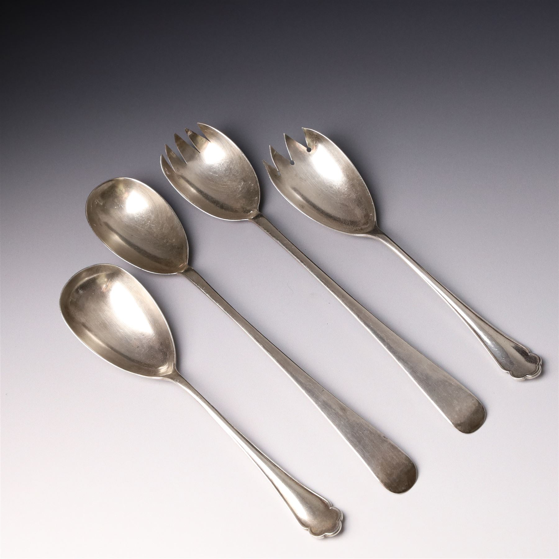 Pair of silver salad servers Sheffield 1905 Maker Walker & Hall, and another pair Sheffield 1915 Maker Atkin Bros