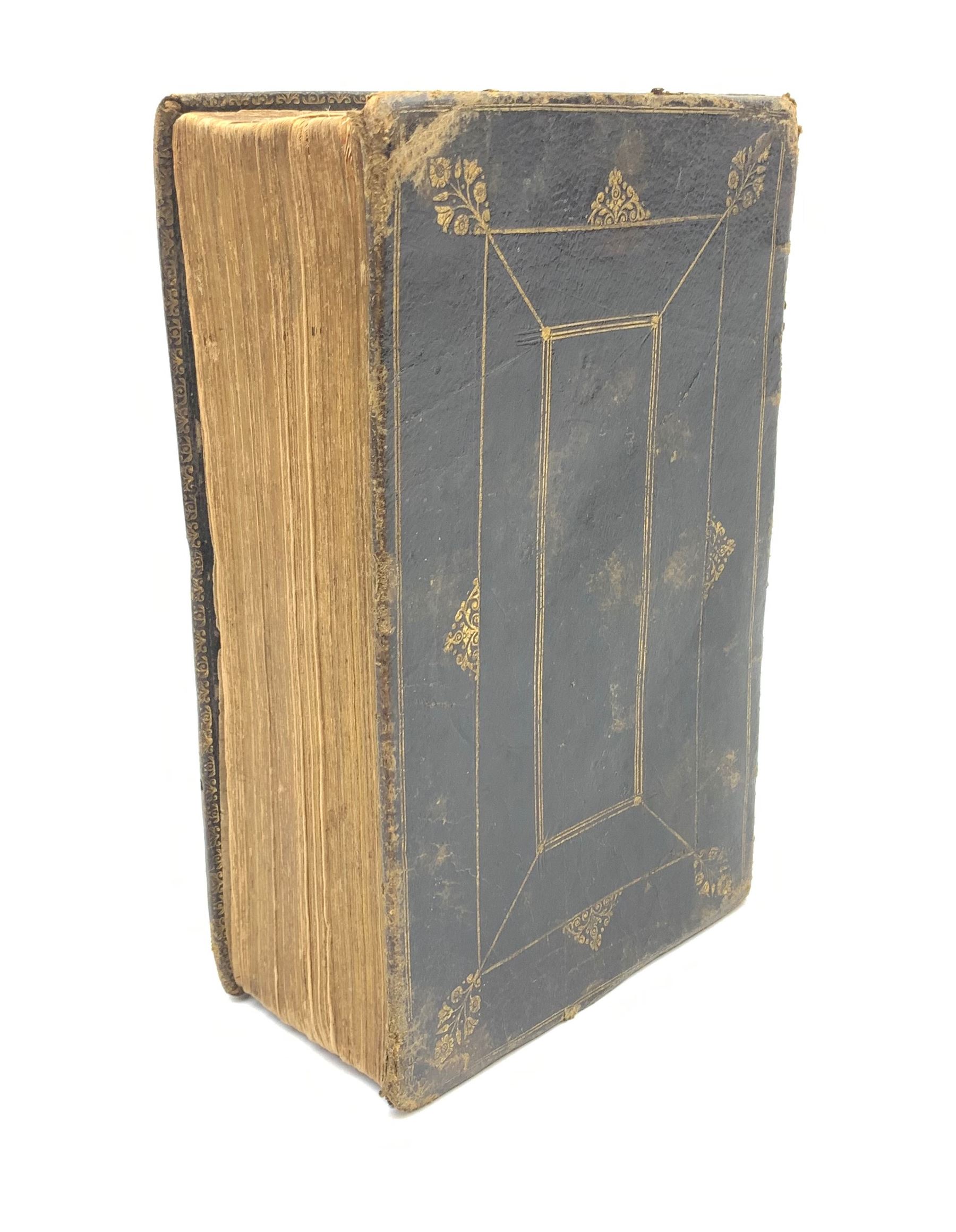 Early 18th century Holy Bible. 1711. London. Printed by The Assigns of Thomas Newcomb and Henry Hills, deceas'd. Printers to the Queens Most Excellent Majesty. Engraved title page. Red lined pages. Full tooled leather/gilt binding with aeg.