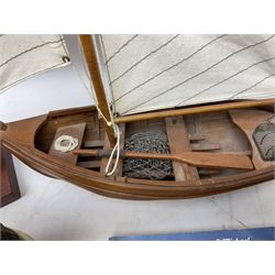 Nautical themed decorative items, to include Titanic book ends, model boat, books, lighthouse lamp etc in one box