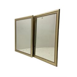 Pair large rectangular wall mirrors, moulded frames in silvered finish with beaded inner slip, bevelled plate