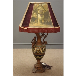  Large Italian gilt metal and moulded pottery table lamp in the form of a cherub mounted ewer with window lit shade, H101cm overall  
