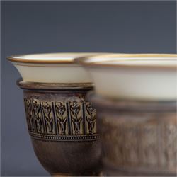 Set of six Lenox porcelain coffee cups, with gilt rims, each with American silver openwork cup holders, stamped sterling