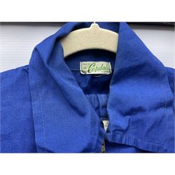 On the direct instructions of Anita Porter nee Lonsbrough Great British Olympic and Commonwealth Games gold medal winning swimmer - collection of early and international memorabilia comprising original Huddersfield Bath Club track suit top bearing eight stitched on cloth badges including British Empire & Commonwealth Games 1958 England Team, YSASA, North Eastern Counties ASA, ESSA Division 3,  English Schools Swimming Association winner etc
The swimming costume Anita wore at the 1958 Commonwealth Games in Cardiff, her first major championships, where she won two gold medals. The grey elastic on the sides, in those days, she would use to make it tighter and more streamlined.
Blue track suit from the 1960 Olympics which she wore on the podium receiving the gold medal.
1960 pool side towelling robe used at the Rome Olympics (interesting to note her name is spelt wrong on the embroidered label).
1962 Commonwealth Games pool side towelling robe used in Perth Australia when winning three Gold medals. 
It was also this year she became BBC Sports Personality of the year, the first female to do so.
Her 'lucky' pool side towel which she took with her to every event she competed in and which can be seen round her neck in many official celebratory photographs. Copies of some of these photographs are included for identification.
In addition there are two souvenir programmes of an evening event to honour Anita at The Theatre Royal Huddersfield and she has kindly signed the front cover on one of these.