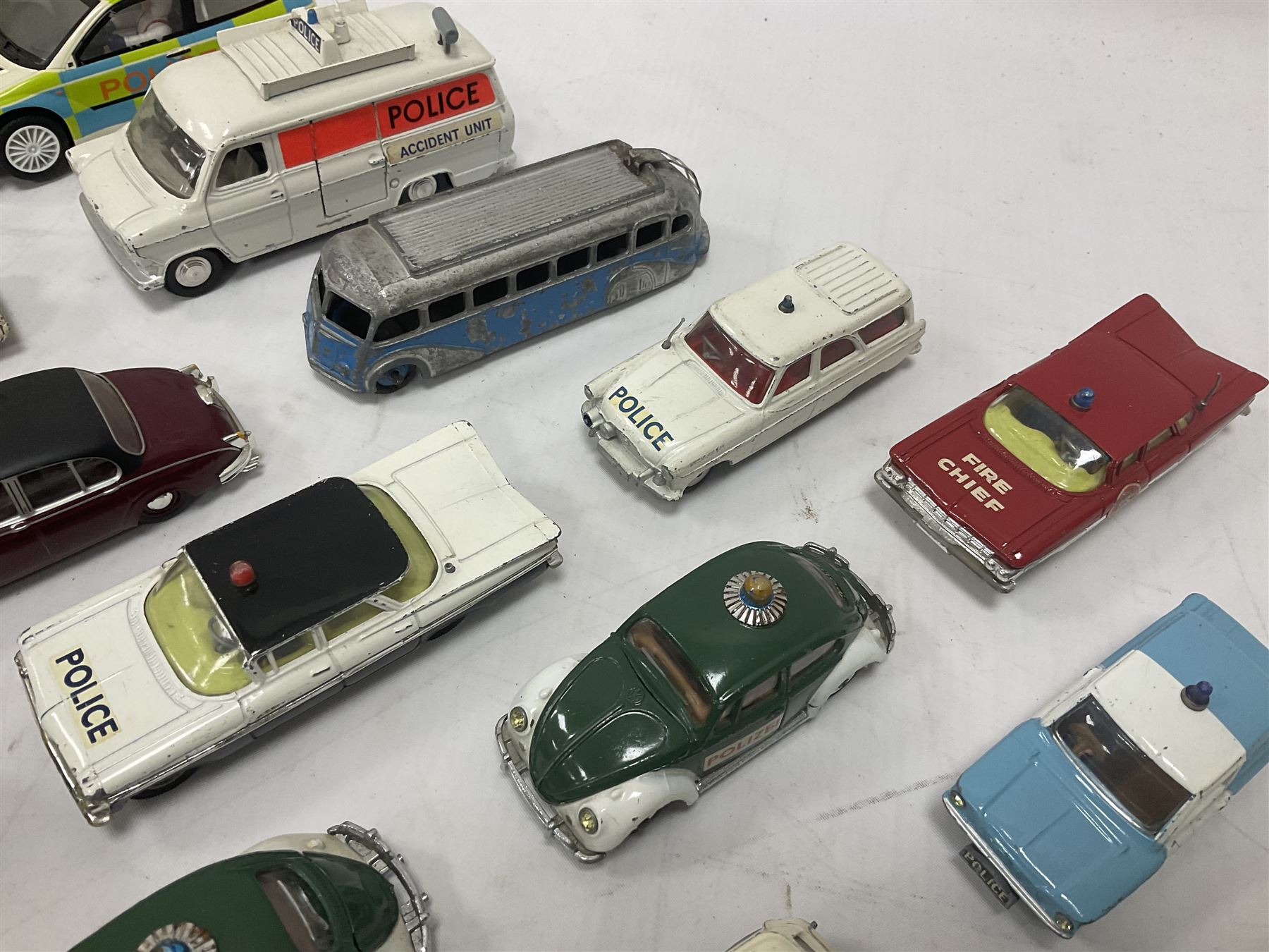 Corgi/Dinky - twenty-four unboxed and playworn die-cast models, predominantly emergency vehicles and buses; including Autocar Isobloc, Superior Criterion Ambulance, Ford Transit Police Vans, Chevrolet Impalas, Minissima, Ausin Mini Police van etc (24)