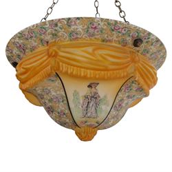  Early 20th century painted glass ceiling light fitting, the domed shade decorated with figural panels alternating with scrolling foliate and floral reserves, centred by a moulded knop finial, in amber and pastel tones
