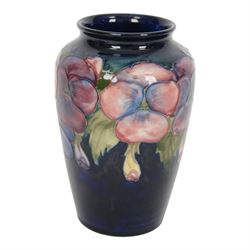 Moorcroft pansy pattern vase, of baluster form, together with Anemone pattern vase and dish, all with impressed marks beneath, pansy vase H16cm 