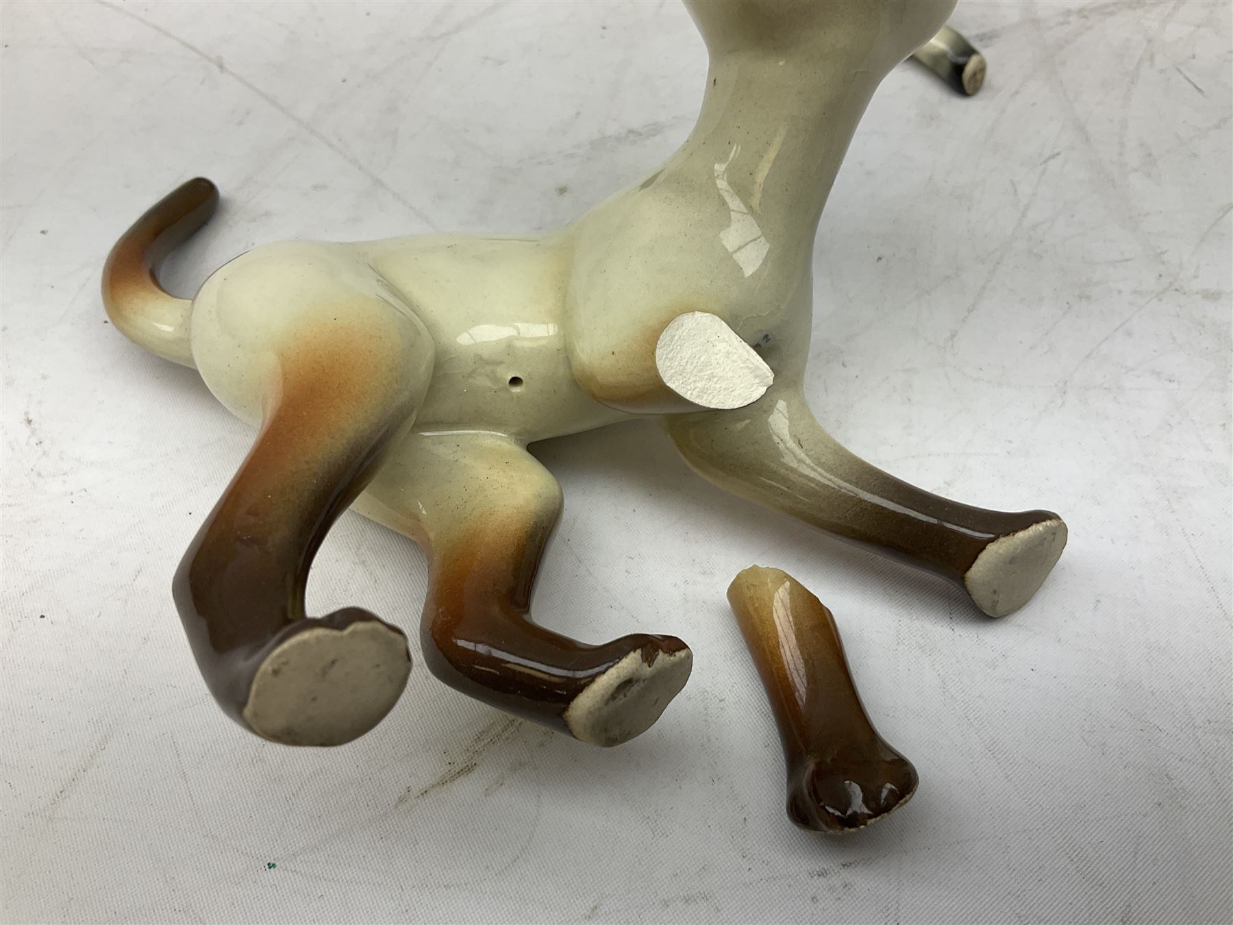 Sylvac blue rabbit no. 1067, green horse no. 1334, jug with squirrel handle no. 1958 (a/f), Royal Doulton dog figure, and other ceramics in one box