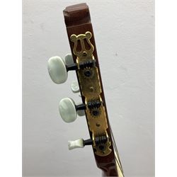 Nagoya Suzuki Model SC240 acoustic guitar with mahogany back and ribs and spruce top, bears label, L101cm; in soft carrying case