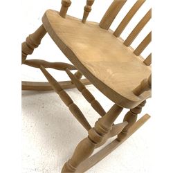 Farmhouse style beech rocking chair, turned supports joined by double H stretcher, W67cm