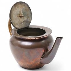 Keswick School of Industrial Arts copper teapot, stylised form with cane wrapped handle, stamped to base KSIA, H13cm 