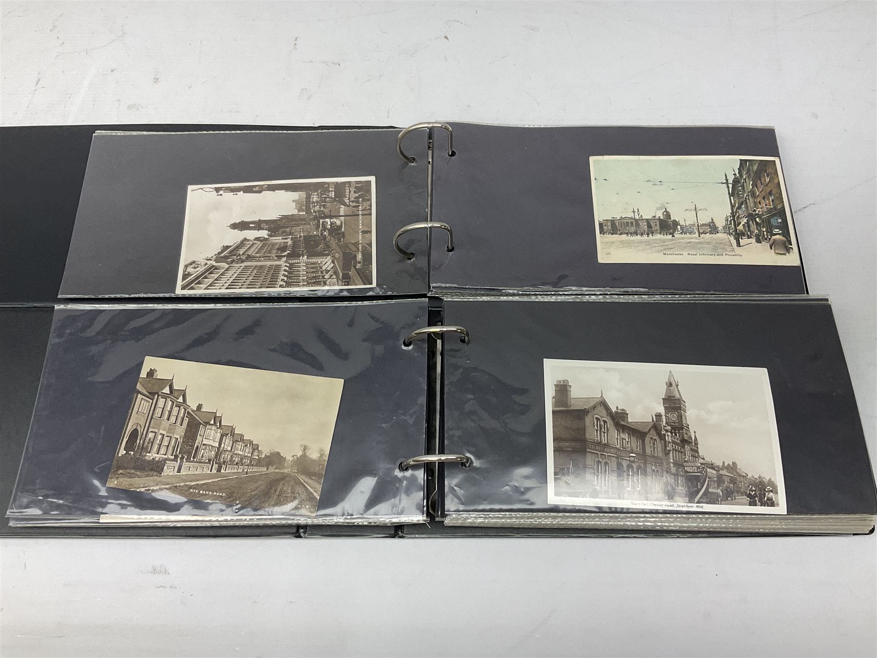 Postcards and postal history, including WWII period items, topographical postcards, military themed postcards including 'Daily Mail Battle Picture', 'War Bond Campaign Post Card' etc, housed in three ring binder albums, and an album containing various photos of men in military uniform dating from the late 1940s
