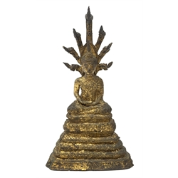 Thai gilt bronze figure of Buddha, enthroned on a seven headed coiled Naga, H30.5cm