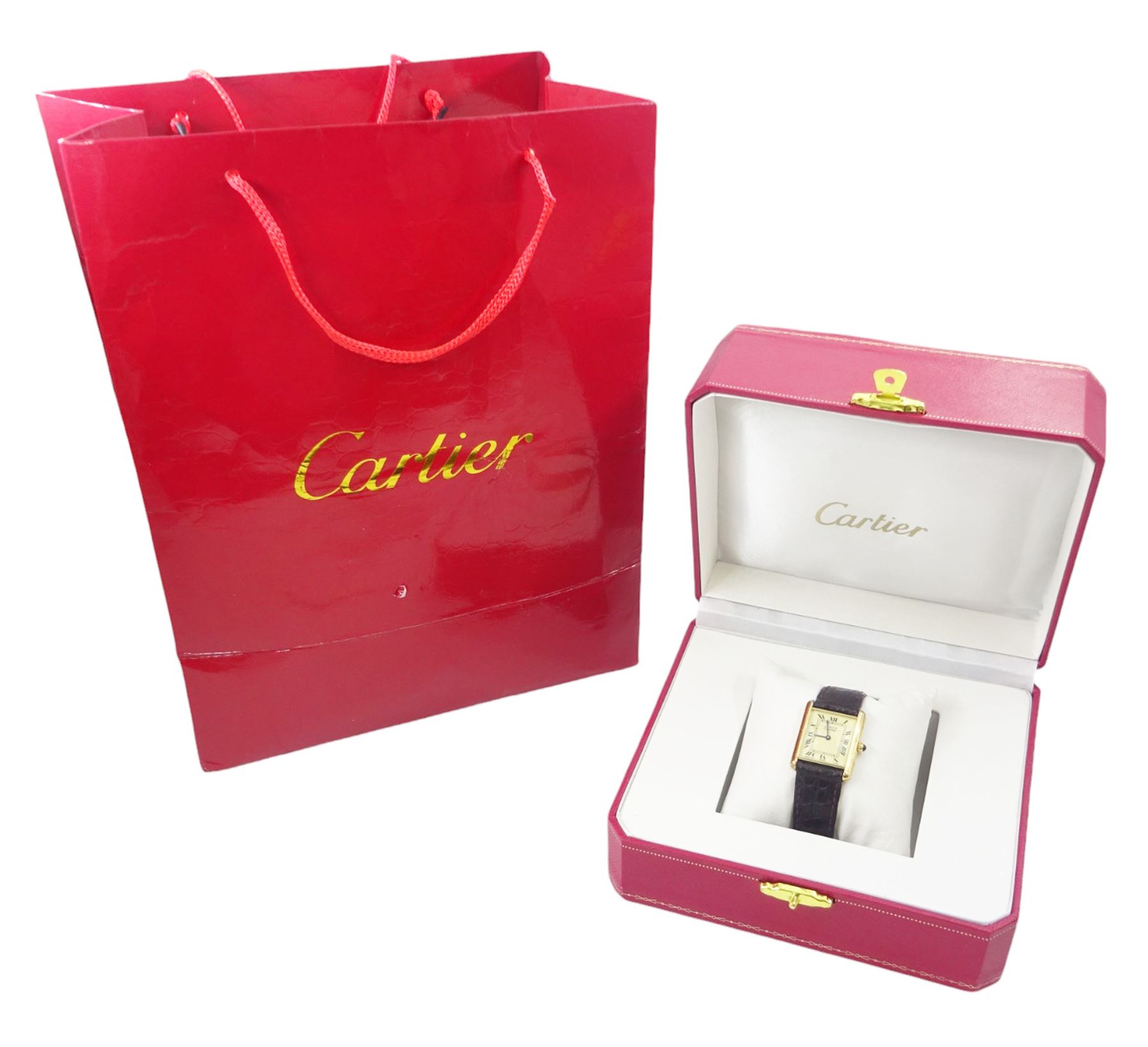Must de Cartier Tank silver-gilt quartz wristwatch, Ref. 1615, cream dial with Roman numeral hour markers, hallmarked, on leather strap, with Cartier stainless steel fold-over clasp, boxed
