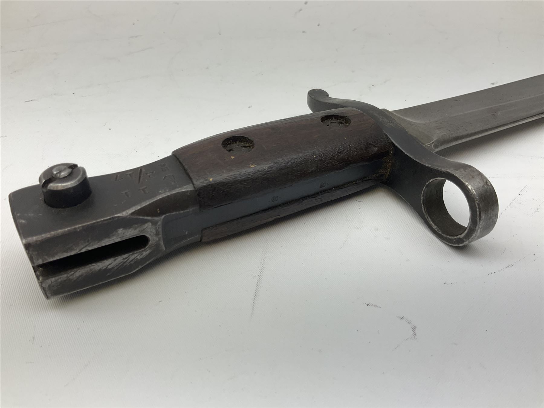 WW1 American Remington P14 rifle bayonet Model 1913, the 43cm fullered steel blade dated 5 17; in metal mounted leather scabbard L57cm overall; and WW1 Canadian Ross Rifle Co.1907 Model Mk.II bayonet, dated 2/17; in leather scabbard with frog (2)