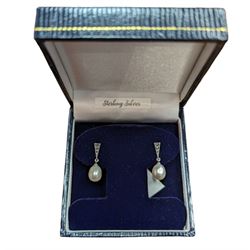 Pair of silver pearl and marcasite pendant stud earrings, stamped 925, boxed