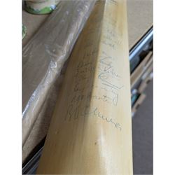 Two signed cricket bats, with signatures including Colin Cowdrey