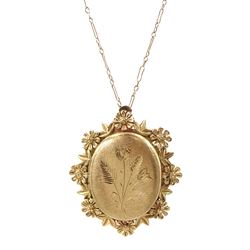 Gold hinged locket pendant/brooch, with foliate border, hallmarked, on 9ct gold link chain necklace