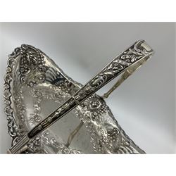 Edwardian silver swing handled basket, of navette form, with four repousse lion masks to each corner and with pierced and embossed floral, scroll and shell decoration to sides, base and handle, hallmarked Charles Horner, Birmingham 1906, height including handle H20cm