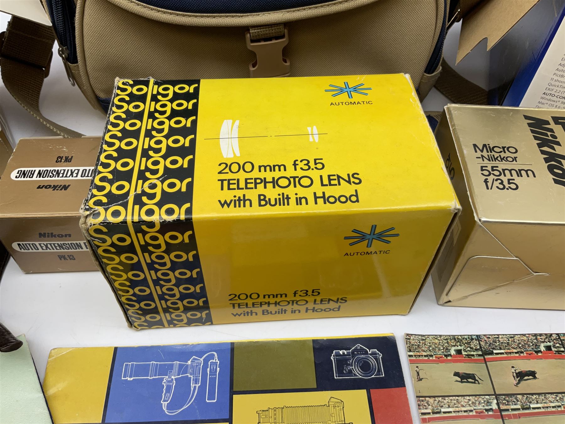 Cameras and accessories including Nikon Nikkormat camera with ‘Nikkor-H 1:2 f=50mm’ lens, Olympus C-8080 wide zoom digital camera, soft case camera bag etc, all untested, in one box