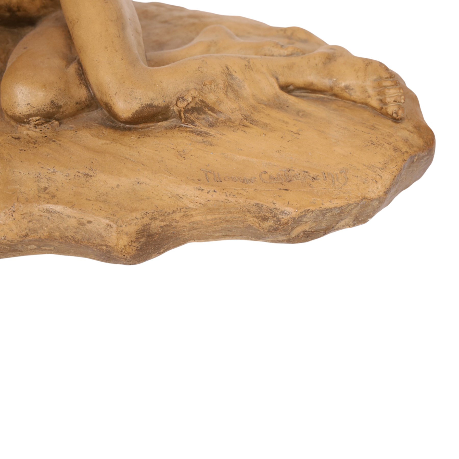 Thomas Cartier (1879-1943); terracotta sculpture of a boy sleep watched over by two dogs, signed to base, H40cm