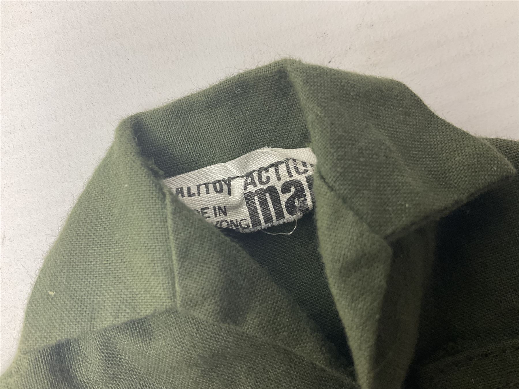 Palitoy Action Man Action Soldier No.34014 with tunic, belt, trousers, boots, blue beret and sten gun; in original box; and Palitoy Action Man Royal Military Policeman (RMP) gripping hands figure, marked 'Made in England by Palitoy under licence from Hasbro © 1964' to rear of torso; with tunic, shirt, trousers, tie, boots, belt, truncheon, pistol in holster, MP armband, red cap, Sterling machine gun and other clothing etc; in anrelated display box (2)