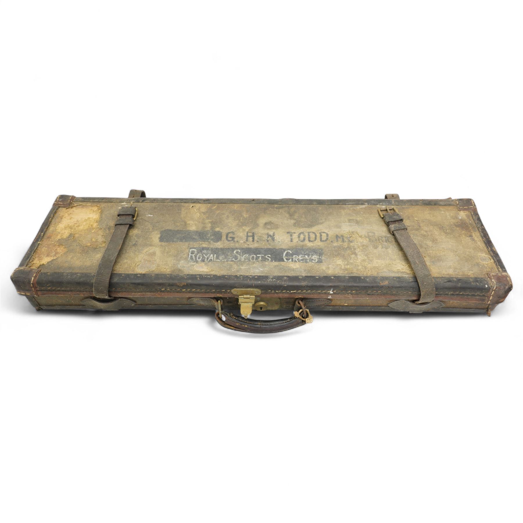 Canvas and leather trimmed shotgun case by Watson Bros., London inscribed G.H.N.Todd, Royal Scots Greys  and two Polo mallets, probably Indian