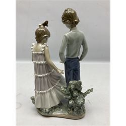 Lladro figure, One, Two, Three, modelled as young boy and girl dancers practicing steps, sculpted by Jose Roig, with original box, no 5426, year issued 1987, year retired 1995, H26cm
