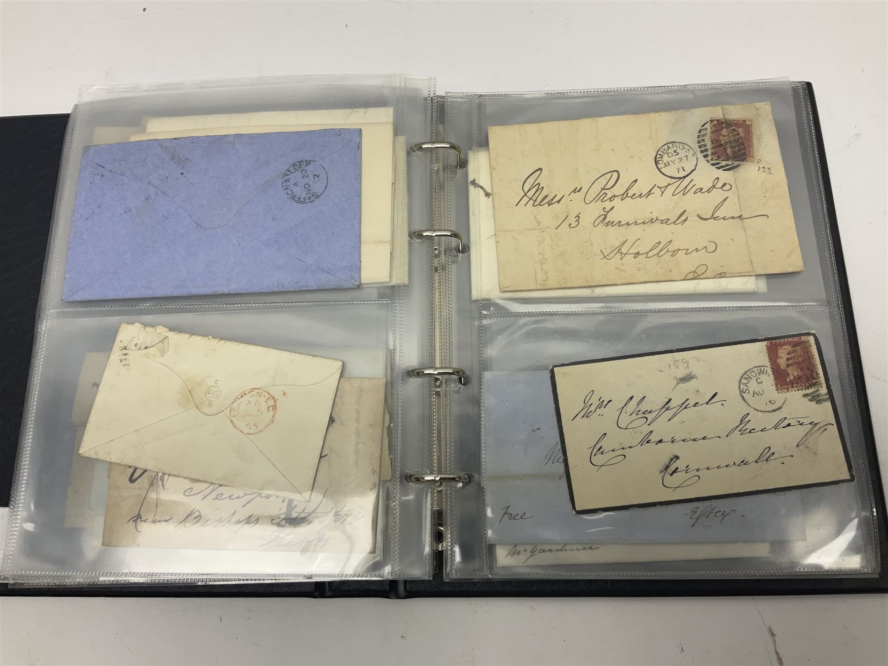 Postal history, including imperf penny reds on covers or entires, mourning cover, Cape of Good Hope overprinted postal stationary, pre-stamp items etc, housed in a ring binder folder