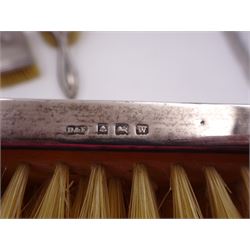 Early 20th century silver vase, of waisted form, with reed and bow border, upon knopped stem and filled circular stepped foot, hallmarked William Comyns & Sons, London 1911, H15cm, together with pair of Indian silver trumpet vases, with chased and embossed floral decoration, a pair of silver mounted clothes brushes, hallmarked Deakin & Francis Ltd, Birmingham 1946  and a 1920s silver mounted hairbrush, hallmarked W J Myatt & Co, Birmingham 1922