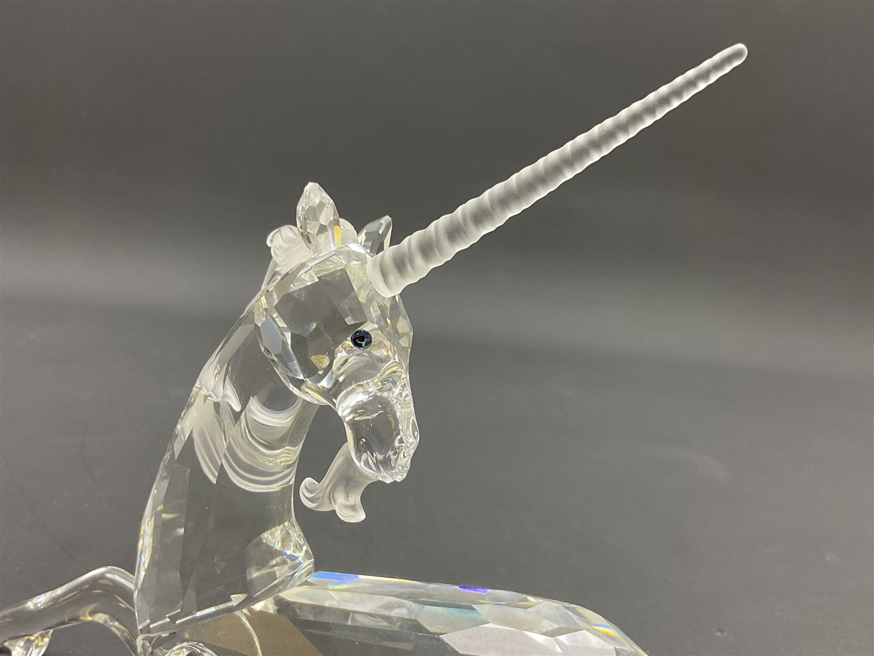 Twenty nine Swarovski Crystal animals, to include koala and baby, in frosted tree branch, elephants, polar bears, squirrel, monkeys, panda, unicorn and snails, etc 