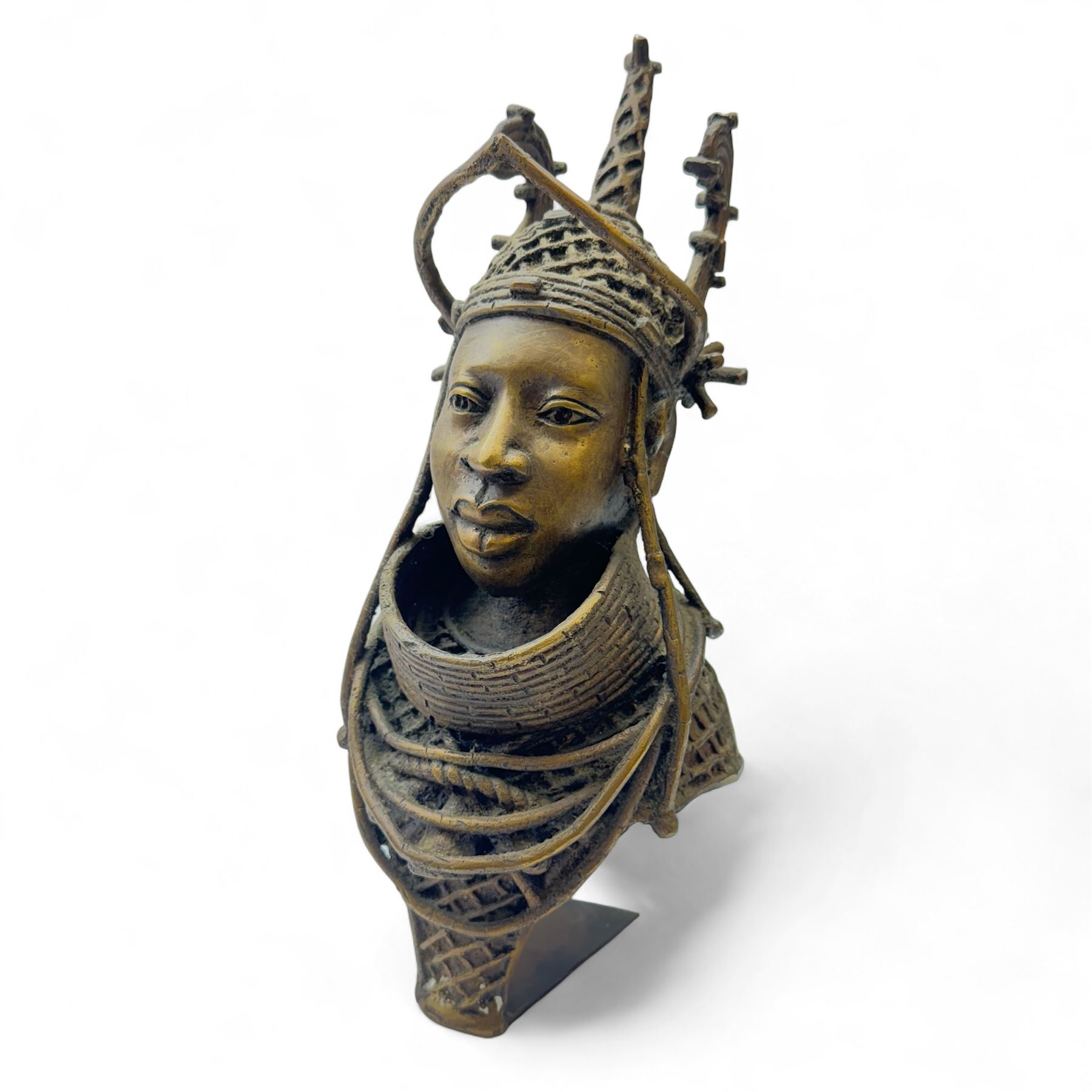 Pair of Benin bronzed busts depicting the Oba of Benin and Queen, together with with other bronzed figures, bust H31cm 