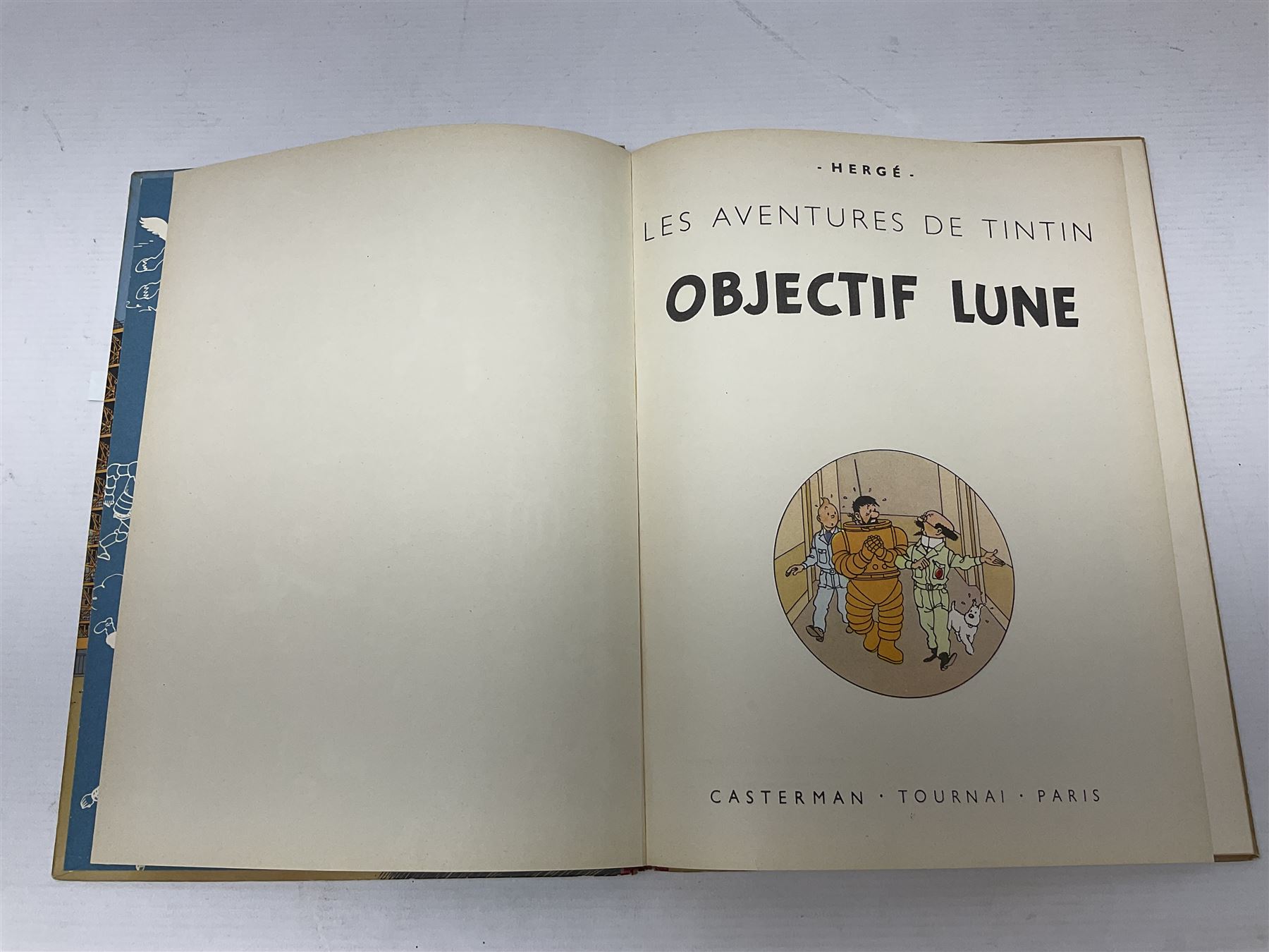 Twenty one first edition Herge, 'The Adventures of Tin Tin' books published by Casterman Bruxelles, with French text and coloured comic strip illustrations throughout; comprising Tintin Au Congo 1946, Tintin En Amerique 1946, Les Cigares du Pharaon 1955, Le Lotus Bleu 1946, L'Oreille Cassee 1943, L'ile Noire 1943, Le Sceptre d O'ttokar 1947, Le Crabe Aux Pinces D'or 1943, L'Etoile Mysterieuse 1942, Le Secret de la Licorne 1943, Le Tresors de Rackan Le Rouge 1945, Les 7 Boules de Cristal 1948, Le Temple du Soleil 1949, Au Pays de L'Or Noir 1950, Objectif Lune 1953, On a Marche sur la Lune 1954, L'Affaire Tournesol 1956, Coke en Stock 1958, Tintin au Tibet 1960, Les Bijous de la Castafiore 1963 and Vol 714 Pour Sydney 1968
