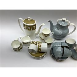 Royal Doulton Forest Glade pattern tea set, comprising teapot, milk jug, open sucrier, six cups and saucers, together with a Wedgwood Susie Cooper tea set, with Greek key decoration, comprising coffee pot, six cups and five saucers, open sucrier and milk jug.