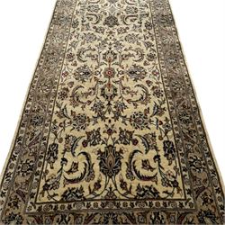 Kashan Persian runner, hand knotted, with floral and arabesque pattern on ivory background